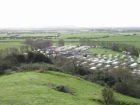 Purn International caravan/camping site with Brent Knoll in the distance.