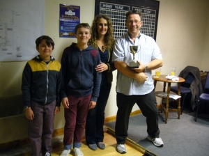 Mike 'Seve' Dyer with John Loxton Memorial Trophy presented by his Daughter Sara and Grandsons Jack & Louie